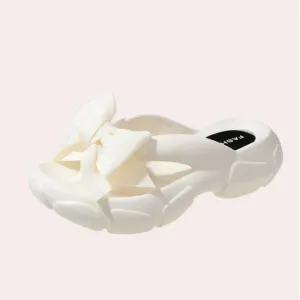 Elegant women's slippers, Damonie, featuring a bow detail