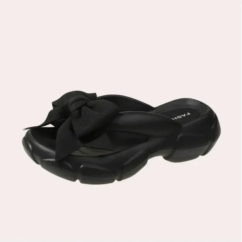 Elegant women's slippers, Damonie, featuring a bow detail