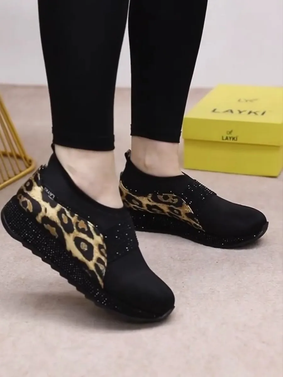 Leopard print flat sneakers