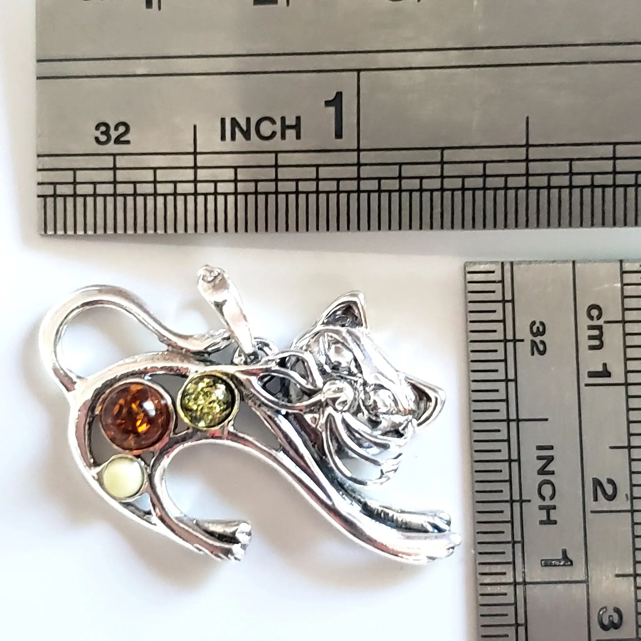 Running Silver Cat Pendant with Multicolor Natural Amber