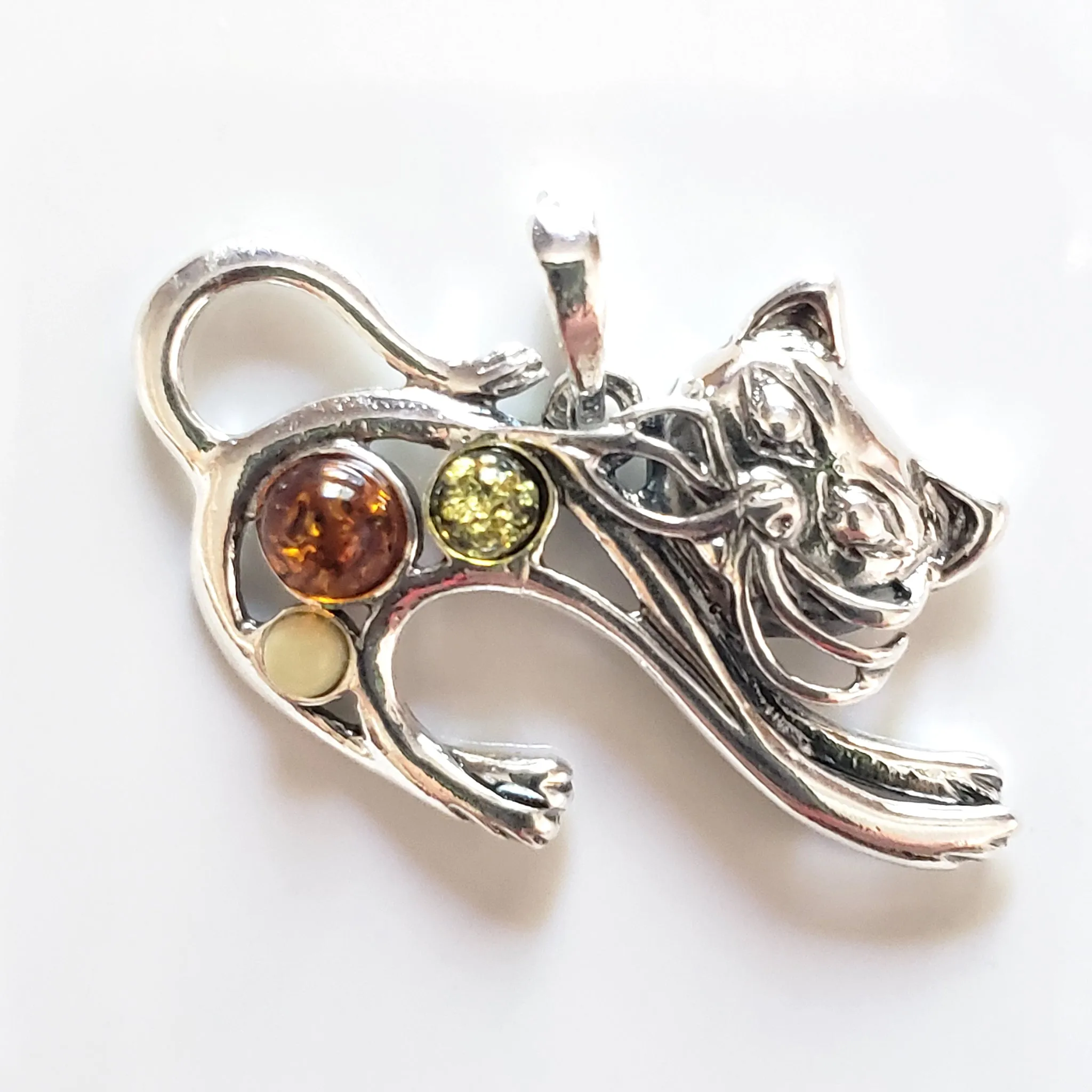 Running Silver Cat Pendant with Multicolor Natural Amber